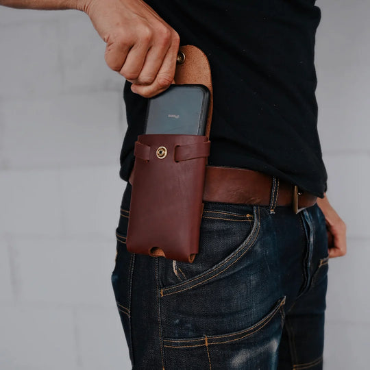 cell phone holster on belt with snaps opened