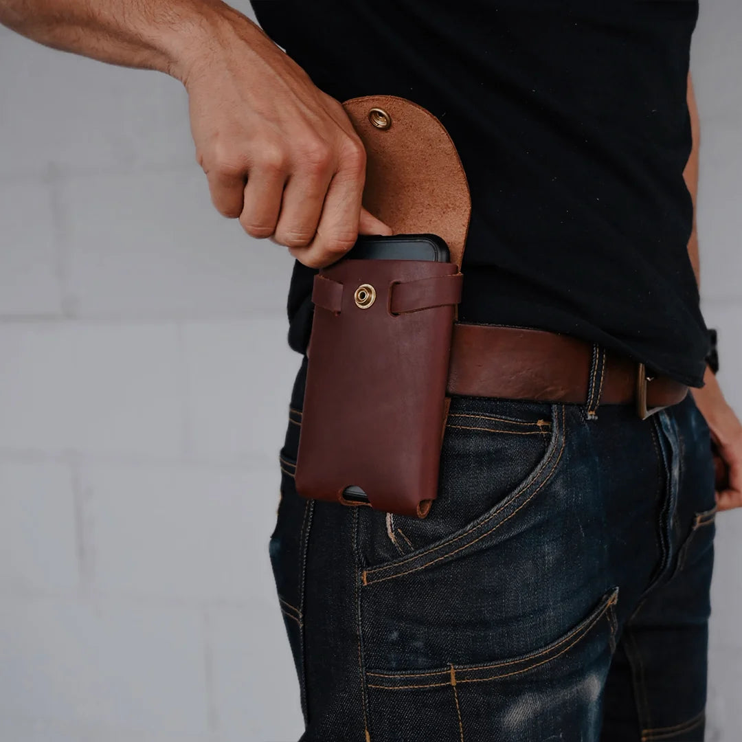 cell phone holster on belt with phone