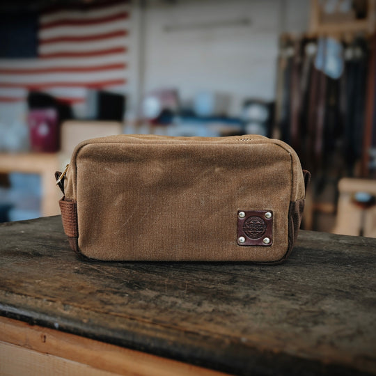 Dopp kit lifestyle photo showing leather patch