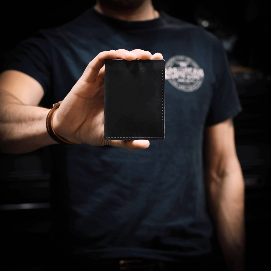 Stitched Leather Bifold Wallet - Black Leather - Front - Lifestyle